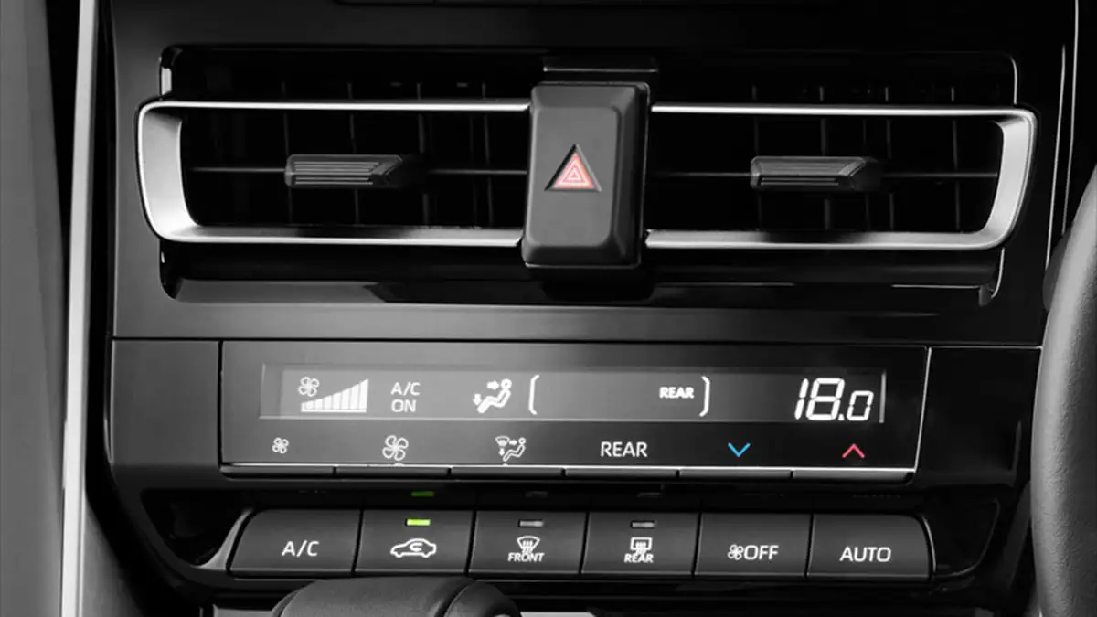 Climate control interface in Toyota Innova Zenix providing precise temperature management and airflow direction