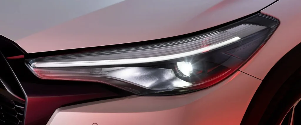 Toyota Corolla Cross GR Sport LED headlight detail showing modern lighting technology and premium design elements