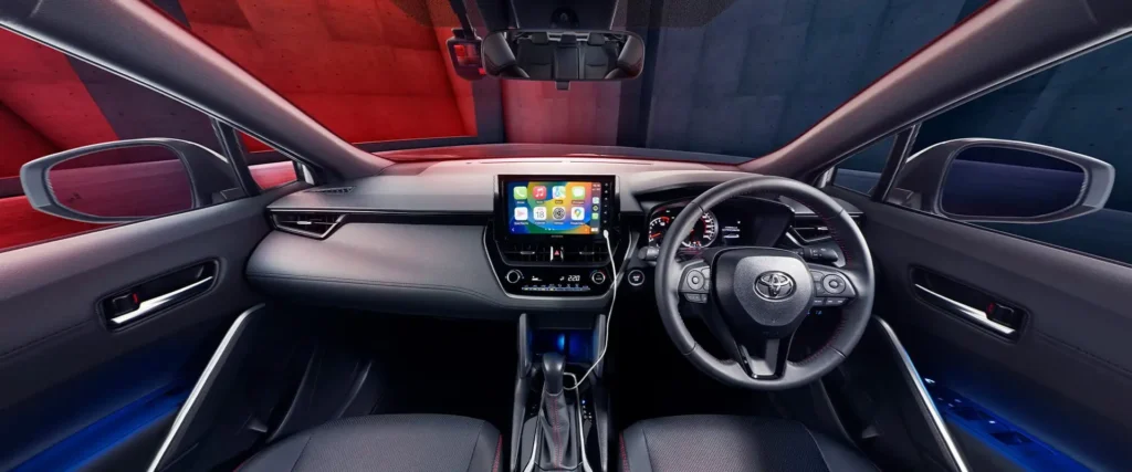 Toyota Corolla Cross GR Sport interior dashboard view with smartphone connectivity and modern infotainment display