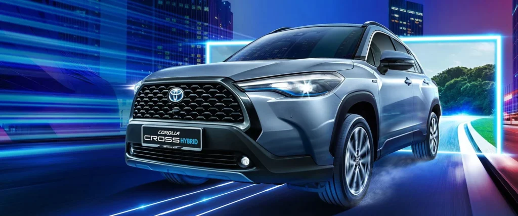 Toyota Corolla Cross Hybrid Electric front view with LED headlights in high-tech environment with digital elements