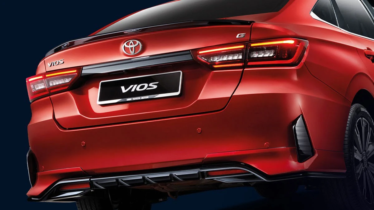 Toyota Vios red sedan rear view showing sporty diffuser and air canards with LED taillight design