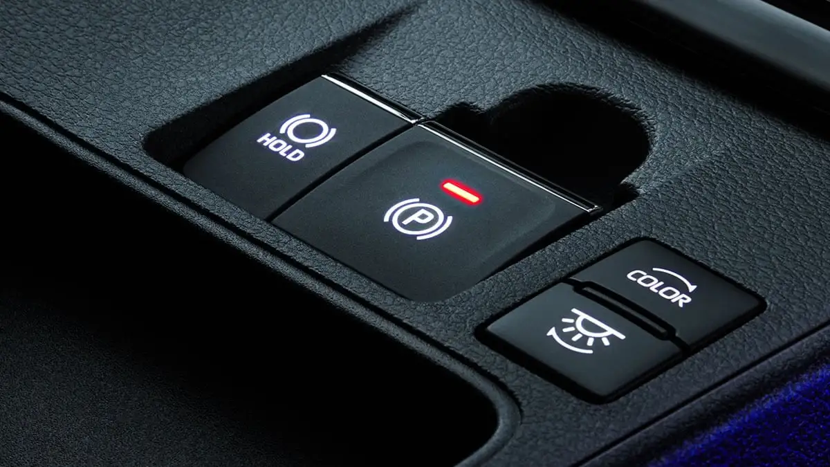 Toyota Vios center console showing electric parking brake and brake hold function control buttons