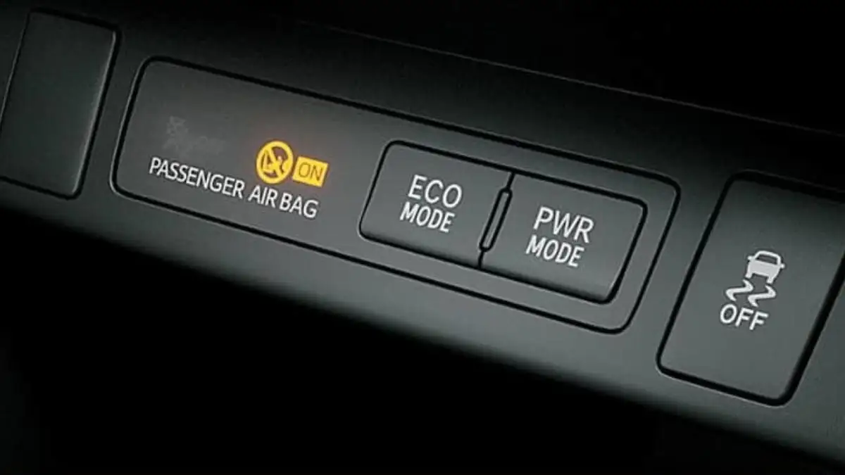 Toyota Innova driver mode controls featuring ECO mode, PWR mode, and passenger airbag safety switches
