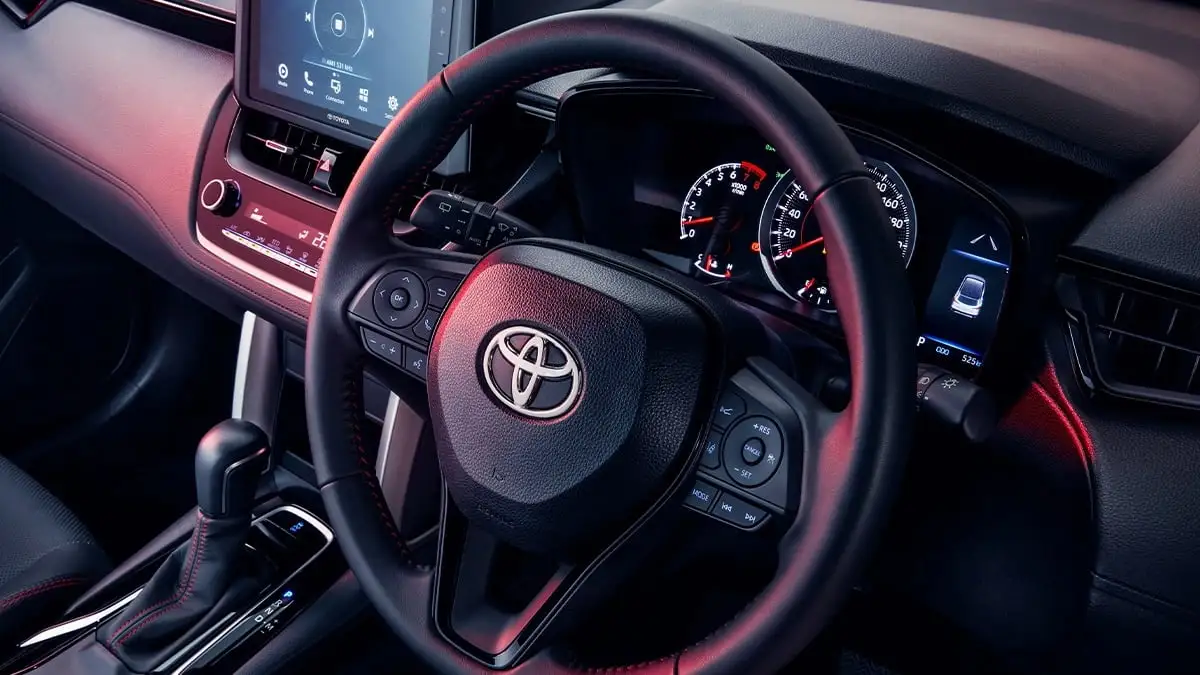 Toyota Corolla Cross GR Sport interior showing electronic power steering with sport ECU