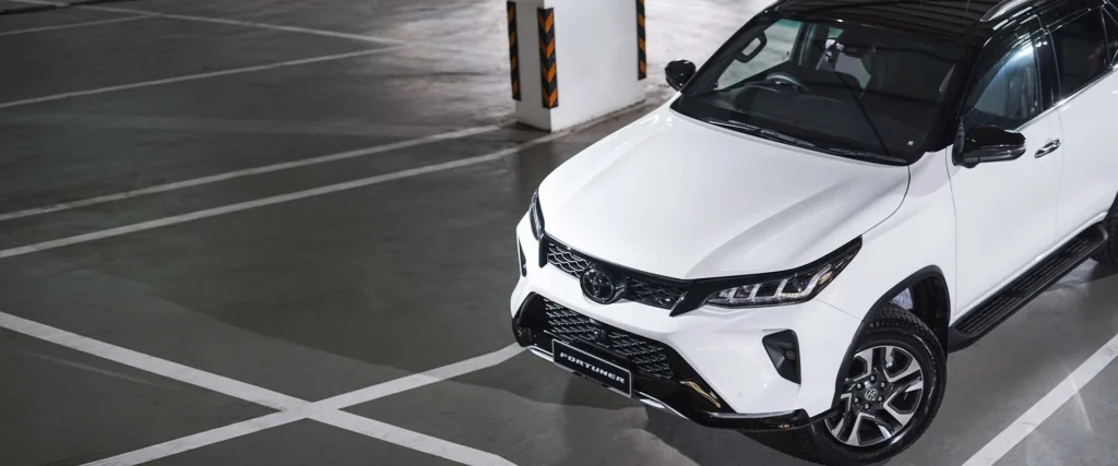 White Toyota Fortuner showcasing modern design elements and robust build quality