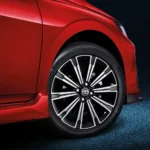 Toyota Vios red car wheel detail showing premium alloy rim design with spoke pattern and tire