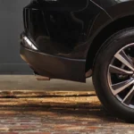 Close-up view of Toyota Harrier wheel featuring multi-spoke alloy rim design and performance tire setup