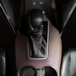 Toyota Harrier automatic transmission shifter with PRND controls and dual cup holders in center console