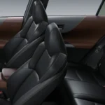Toyota Harrier full interior view displaying black leather seats with brown trim and spacious cabin layout