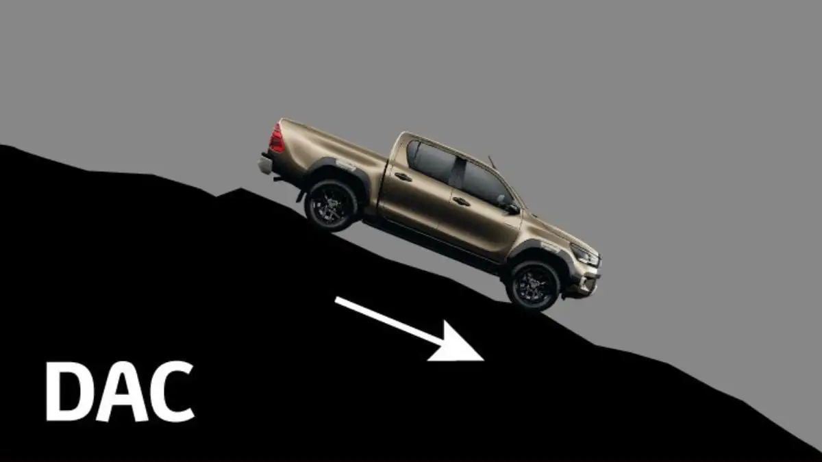 Toyota Hilux featuring DAC downhill assistance showing controlled descent capability for safe off-road driving performance