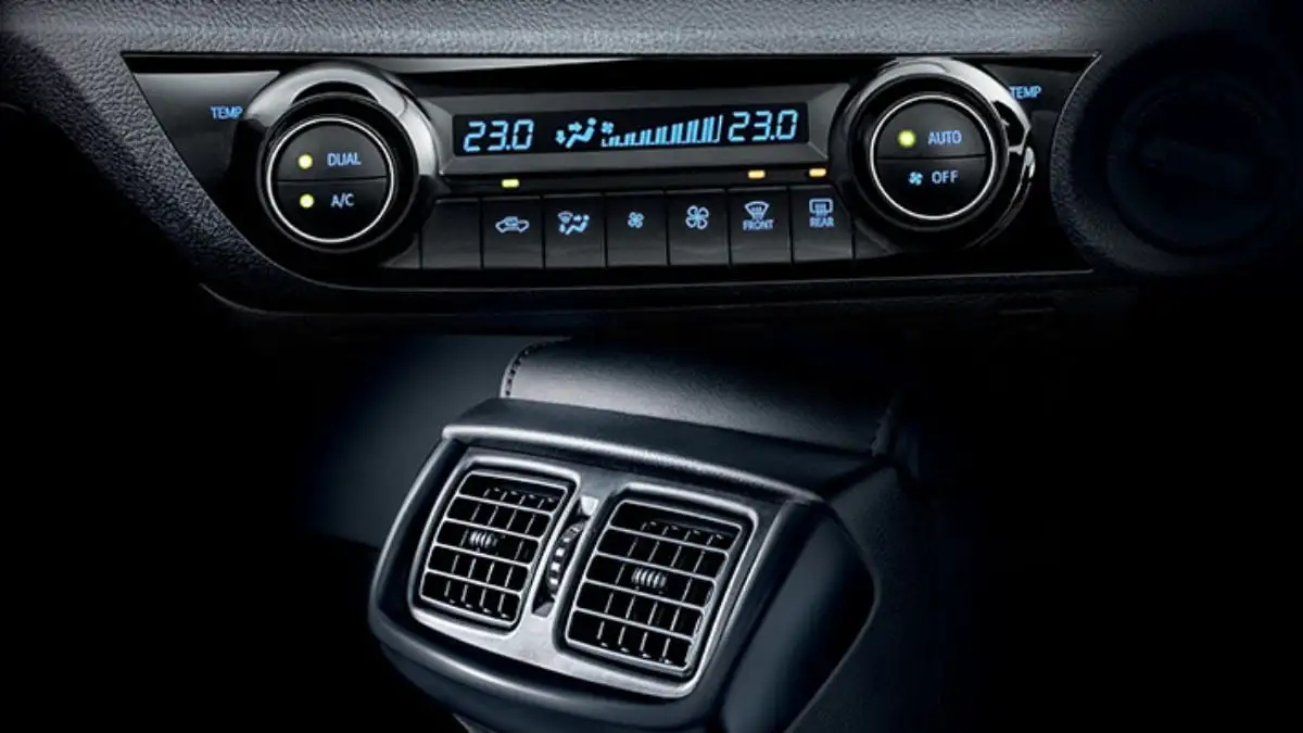 Toyota Hilux dual-zone automatic climate control system with digital temperature display and rear passenger air vents