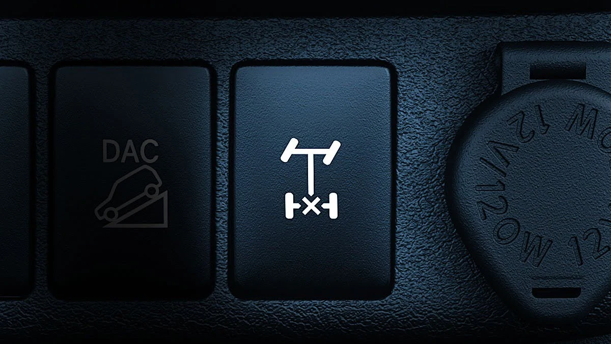 Toyota Hilux dashboard featuring rear diff lock activation button and downhill assist control for off-road capability