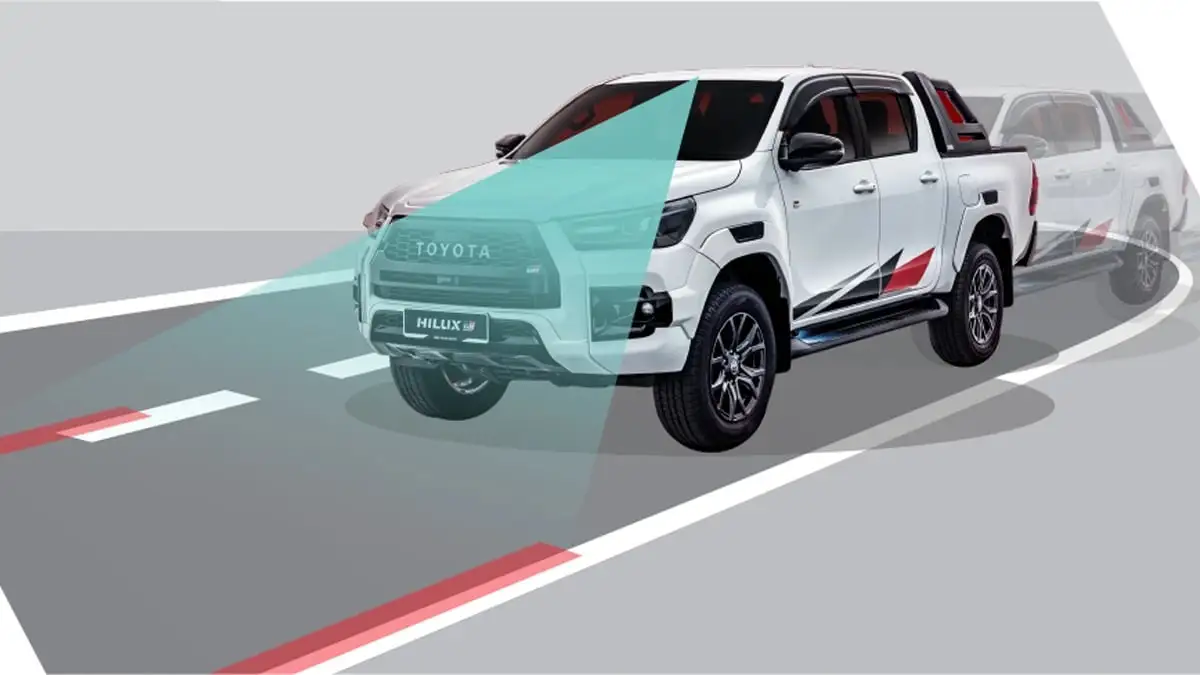 Toyota Hilux demonstrating LDA safety technology with visual lane monitoring and yaw assist technology on track