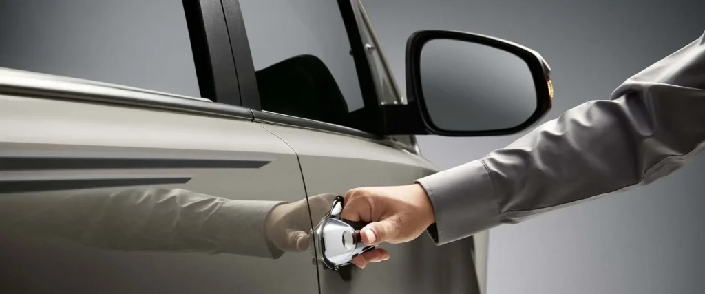 Exterior door handle of Toyota Innova with polished finish and integrated security features