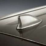 Modern roof-mounted antenna system on Toyota Innova featuring streamlined design