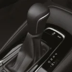 Toyota Corolla automatic transmission shifter console with ECO sport mode buttons and electronic controls