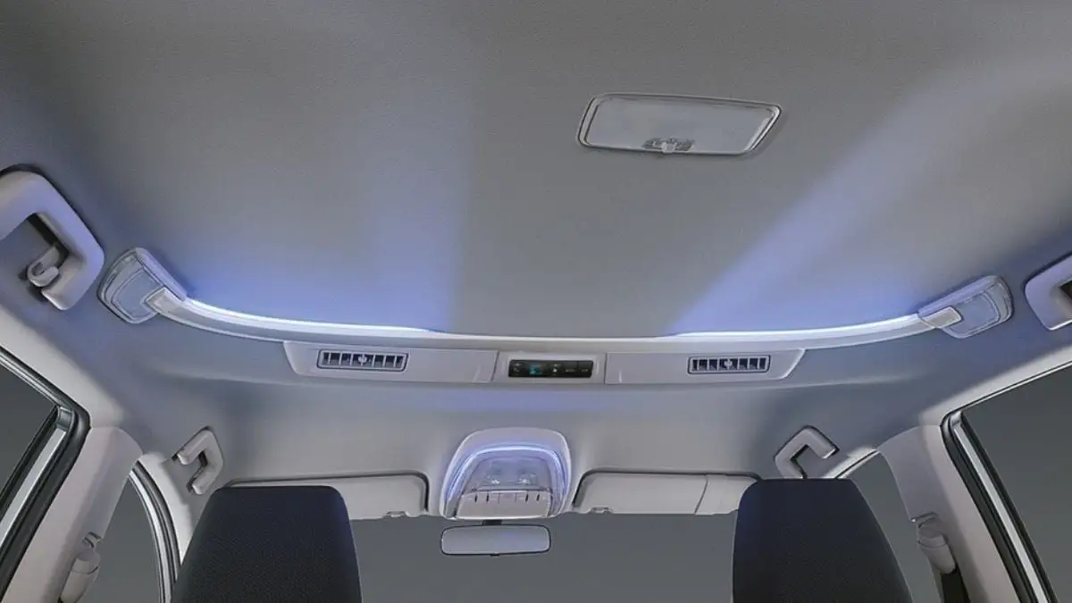 Toyota Innova roof console with ambient LED lighting and climate control vents for rear passenger comfort