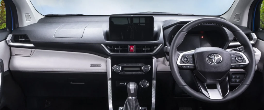 Toyota Veloz complete interior dashboard view with steering wheel, touchscreen display and center console