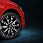 Toyota Vios red car wheel detail showing premium alloy rim design with spoke pattern and tire