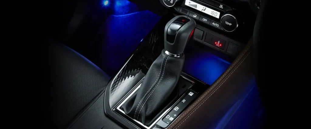 Toyota Vios automatic CVT transmission gear shifter with leather boot and blue ambient floor lighting