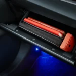 Car interior storage in Toyota Vios featuring practical compartment space with emergency items and lighting