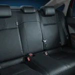 Car back seat interior in Toyota Vios showing comfortable passenger seating with safety features