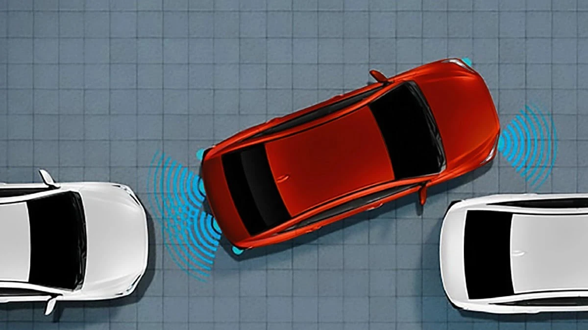 Safety illustration featuring Toyota Vios ultrasonic parking sensors with 6 sensors detection around vehicle
