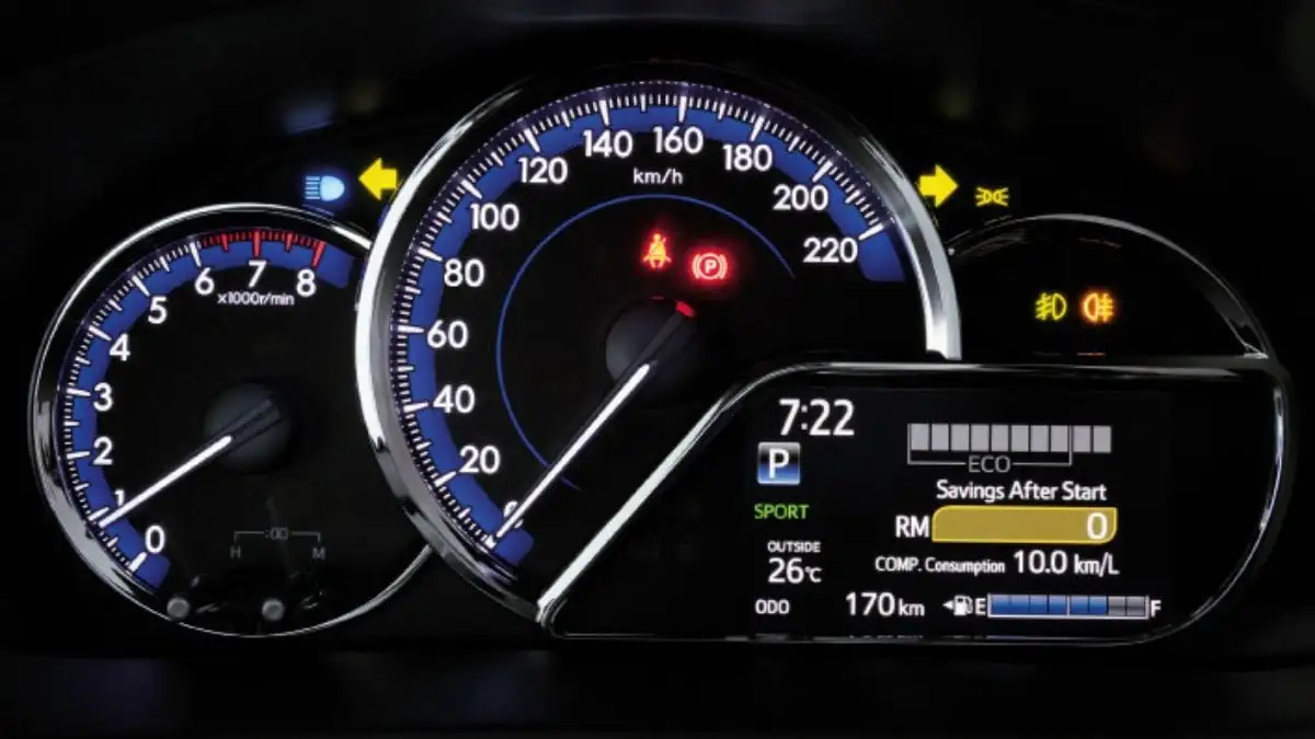 Toyota Yaris Optitron meter cluster with multi-information display showing fuel economy and vehicle diagnostics