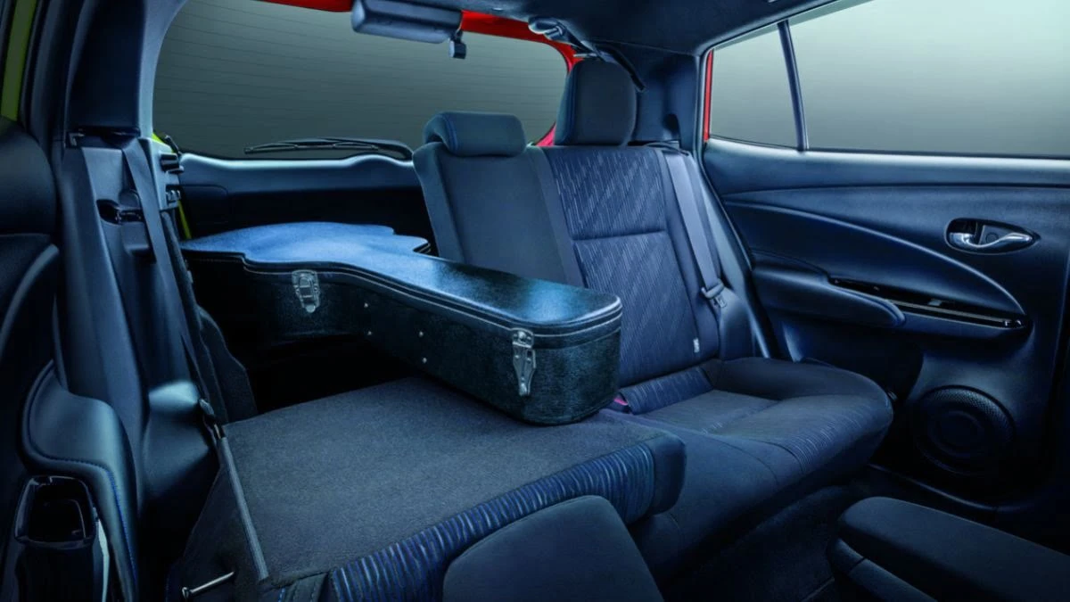 Toyota Yaris split-fold rear seating configuration with suitcase showing practical storage capability