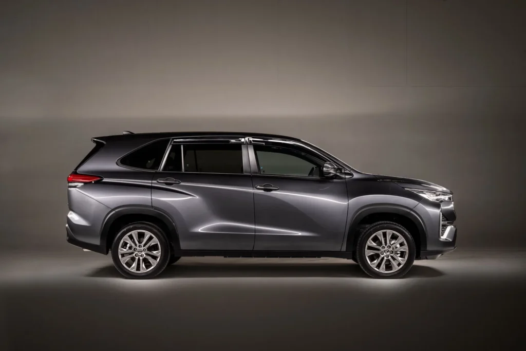 Toyota Innova Zenix side view showcasing streamlined design and modern crossover vehicle architecture