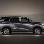 Toyota Innova Zenix side view showcasing streamlined design and modern crossover vehicle architecture