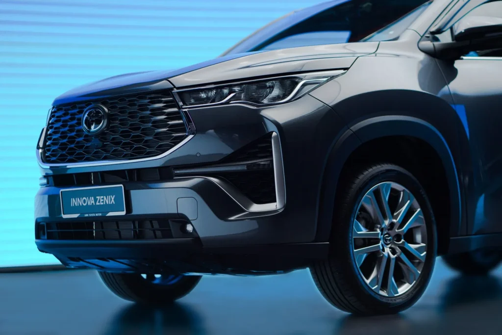 Modern Toyota Innova Zenix exterior featuring sleek headlamps and contemporary automotive styling elements