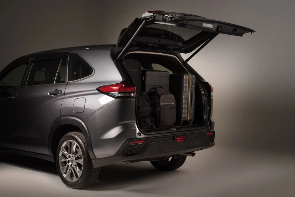 Rear storage demonstration of Toyota Innova Zenix showing practical luggage compartment and easy access