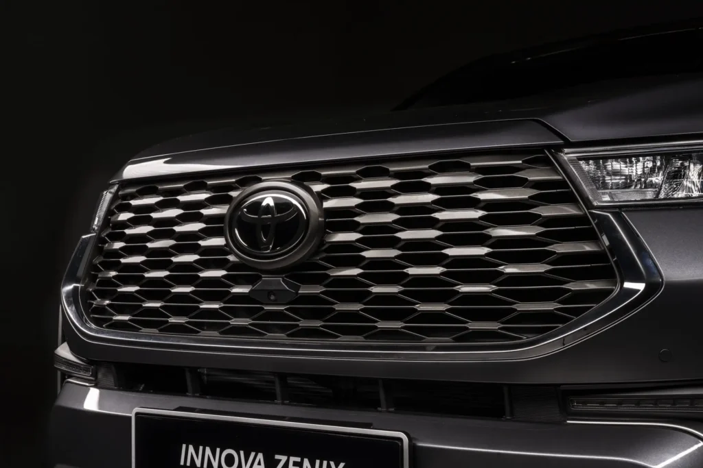 Toyota Innova Zenix honeycomb front grille detail with chrome accents and premium finish quality