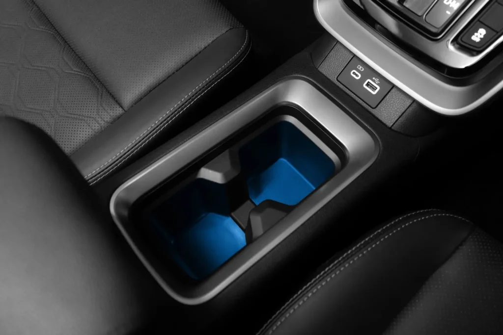 Interior storage solution in Toyota Innova Zenix providing organized space for personal items and accessories