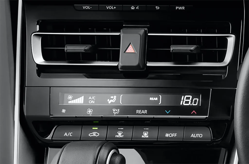 Climate control interface in Toyota Innova Zenix providing precise temperature management and airflow direction