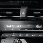 Climate control interface in Toyota Innova Zenix providing precise temperature management and airflow direction