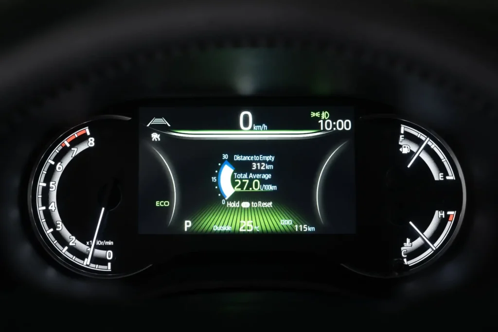Toyota Innova Zenix digital instrument cluster displaying ECO mode with fuel efficiency and speed readings