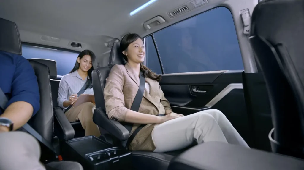 Interior comfort demonstration of Toyota Innova Zenix Hybrid Electric featuring relaxed family travel experience