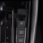 Center console of Toyota Innova Zenix displaying automatic transmission shifter and driving mode options