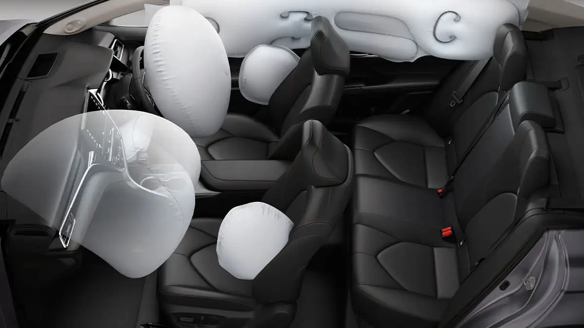 7 SRS Airbags in Toyota Camry interior showing comprehensive airbag safety system with multiple inflated airbags throughout cabin