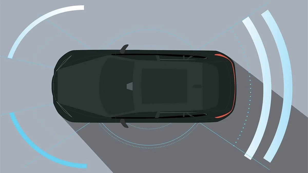 Toyota Camry with Intelligent Clearance Sonar system showing 360-degree proximity detection zones