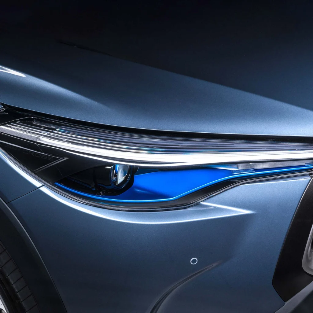 Toyota Corolla Cross Hybrid Electric alloy wheel detail showing multi-spoke design and brand center cap logo