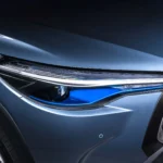 Toyota Corolla Cross Hybrid Electric alloy wheel detail showing multi-spoke design and brand center cap logo