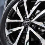 Toyota Corolla Cross Hybrid Electric rear taillight detail with LED technology and spoiler design element