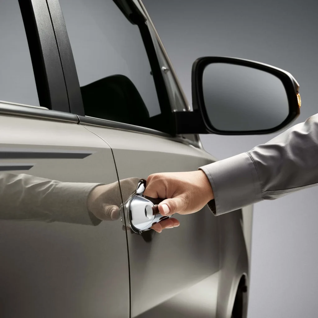 Exterior door handle of Toyota Innova with polished finish and integrated security features