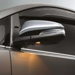 Toyota Innova side mirror with integrated turn signal and chrome accent for enhanced visibility and style