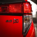 Toyota Innova LED taillight detail showing modern lighting technology with distinctive red illumination pattern