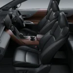 Toyota Harrier front interior view displaying black leather seats with brown trim and spacious cabin layout