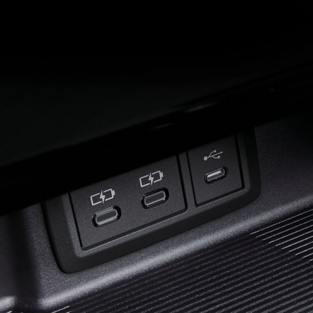 Close-up of Toyota Harrier dashboard featuring multiple charging ports